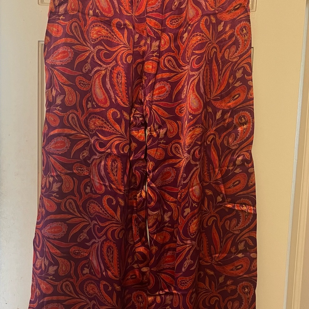 Free People satin wide leg pant.  30 inch  inseam, they are long.  Never worn!